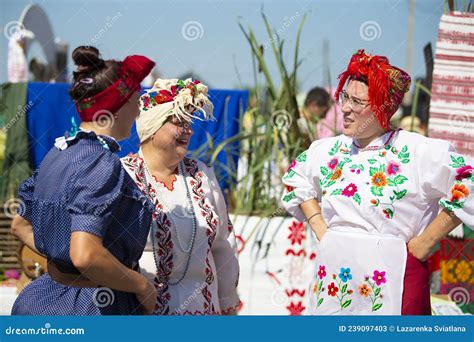 Women In Ethnic Slavic Costumes At The Fair Editorial Stock Photo