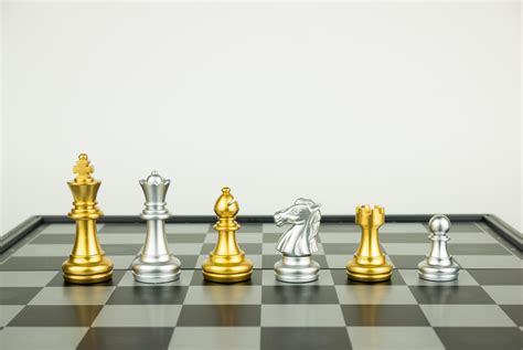 Gold and silver chess pieces 3670916 Stock Photo at Vecteezy