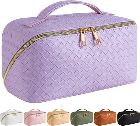 Amazon SFXULIX Large Capacity Travel Cosmetic Bag Makeup Bag PU