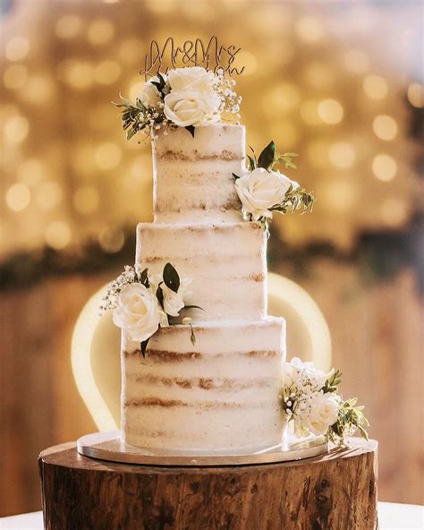 Classic Semi Naked Buttercream Cake With White Rose Clusters Bay Tree