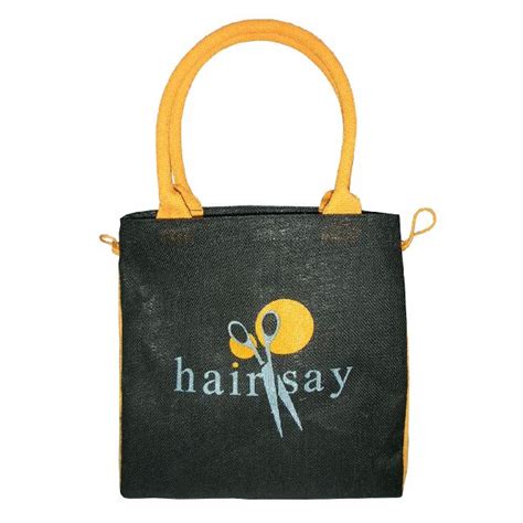 Tokra Impex Pp Laminated Inside Hanging Zip Pocket Jute Tote Bag At Rs