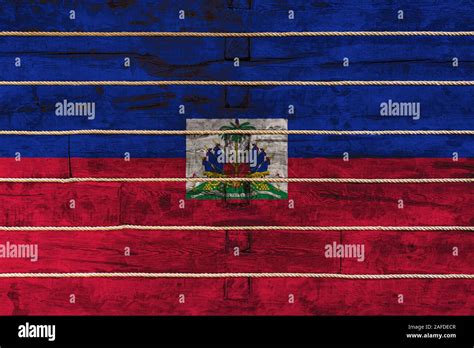 National Flag Of Haiti On A Wooden Wall Background The Concept Of National Pride And A Symbol