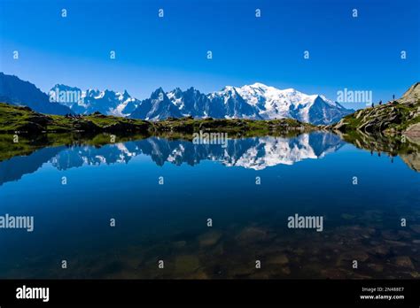 The Peaks Of The Mont Blanc Massif Are Reflecting On The Surface Of