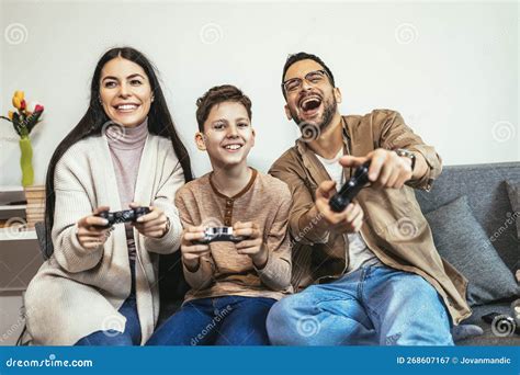 Family Playing Video Games at Home and Having Fun Together Stock Image ...