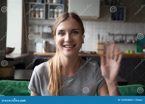 Portrait Happy Smiling Woman Waving Hand Looking At Camera Stock Photo