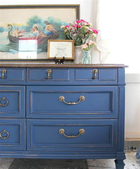 Heir and Space: A Vintage Sideboard in Blue