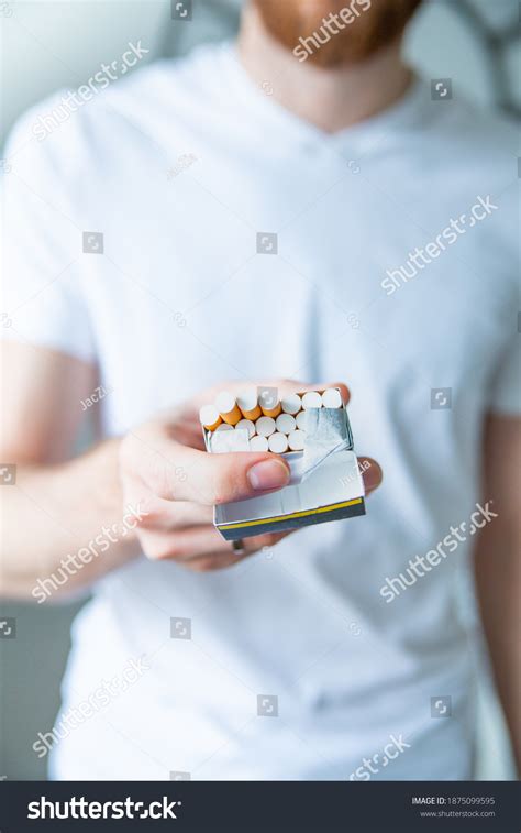 Giving Someone Cigarette Pack Cigarettes Male Stock Photo 1875099595