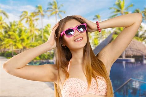 Premium Photo Woman In Bikini And Sunglasses Isolated