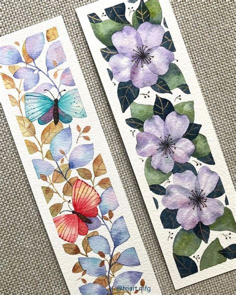 Two Bookmarks With Watercolor Flowers And Leaves Painted On Them One