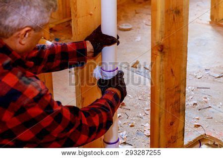 Plumber Installing Pvc Image & Photo (Free Trial) | Bigstock