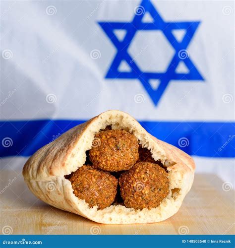 Fresh Falafel Balls In A Pita Over Israel Flag Background Stock Photo