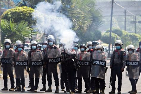 Police crack down on protesters in the streets of Myanmar after ...