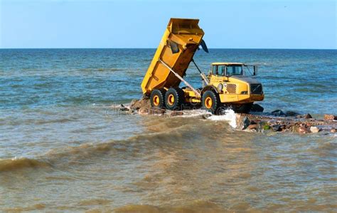 Construction of Breakwaters, Construction Equipment on the Sea Coast ...