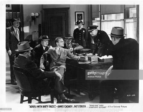 James Cagney Staring At A Policeman In A Scene From The Film Angels