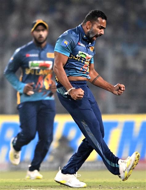 :Kolkata:Sri Lanka's Chamika Karunaratne celebrates the dismissal of ...