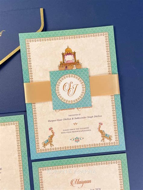 Royal Swagat Teal Sikh Wedding Card By Rohan Aparna