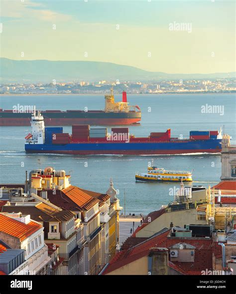 Ships On The Tagus River In Lisbon Harbor At Sunset Portugal Stock