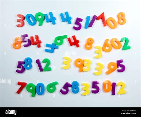 magnetic numbers on white background Stock Photo - Alamy