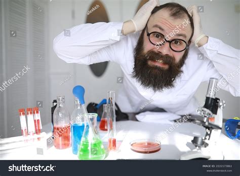 chemist crazy mad scientist conducts experiments stock photo
