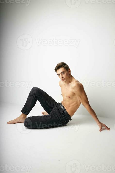 Man Sits On The Floor In Black Trousers Nude Torso Posing Elegant Style