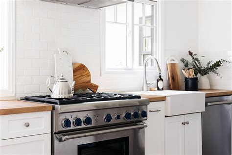 Kitchens With White Cabinets And Butcher Block Countertops We Love