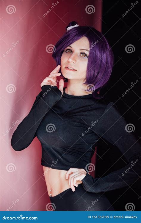 Portrait Of A Beautiful Woman Anime Cosplayer With Purple Hair Stock