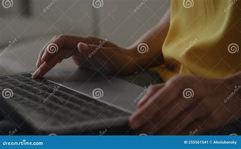 Close Up Of African Amerian Woman Hands Using Laptop Touchpad Pinch