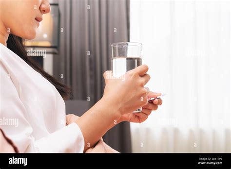 Sick Women Hand Hold A Glass Of Water Healthcare And Medicine Recovery