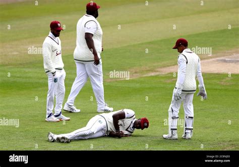 West Indies captain Jason Holder lies on the floor after suffering an injury during day three of ...