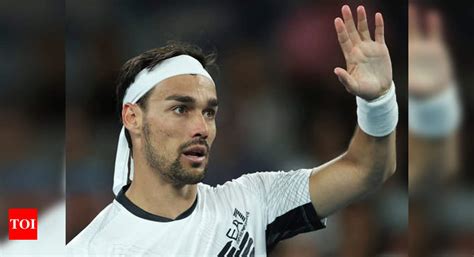 Fabio Fognini Height : Fabio Fognini drops racket after serve, still ...