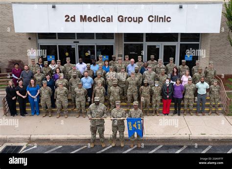 Members From The 2nd Operational Medical Readiness Squadron Pose For A