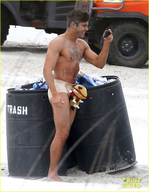 Zac Efron Runs Around Shirtless Nearly Naked In These Amazing Photos