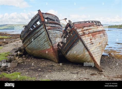 Two Abandoned Fishing Boats On The Shore Of Salen Bay Isle Of Mull