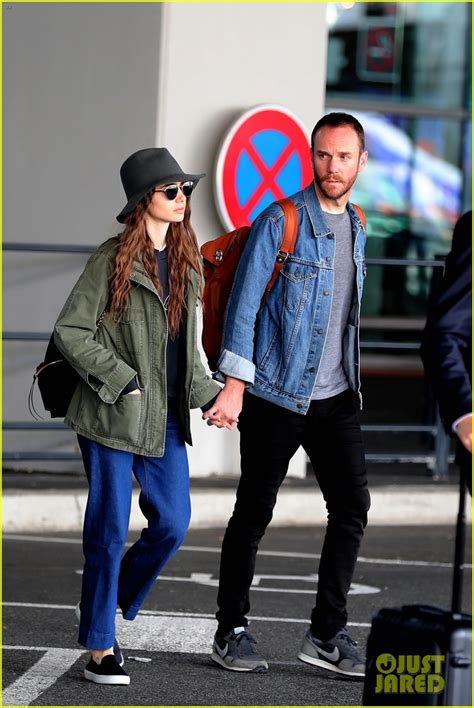 Lily Collins Arrives Back in Paris with Boyfriend Charlie McDowell ...