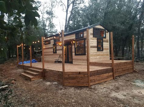 Beautiful 28ft Cedar Tiny House with Custom Deck by KJE Tiny Homes