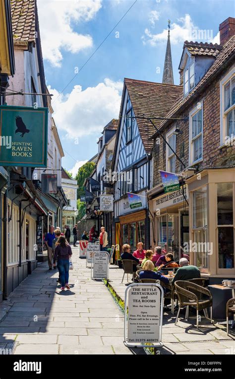 Cafe and old street scene in Frome town, Somerset UK Stock Photo ...