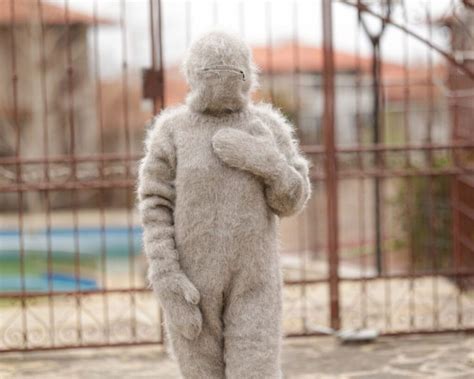 Hand Knitted Beige Catsuit With A Balaclava Mittens And Socks Knitted