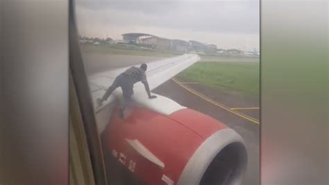 Man Jumps On Plane S Wing As It Prepares For Takeoff Iheart