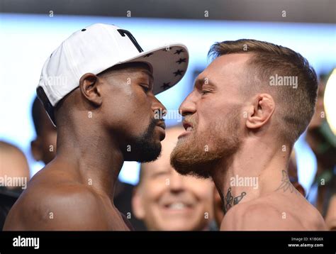 Floyd Mayweather Jr And Conor Mcgregor During The Weigh In At The T Mobile Arena Las Vegas