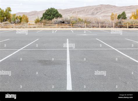 An empty parking lot in Great Sand Dunes National Park, Colorado during ...