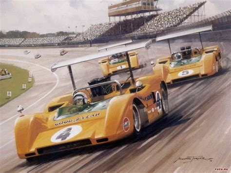 Two Yellow Race Cars Racing On A Track