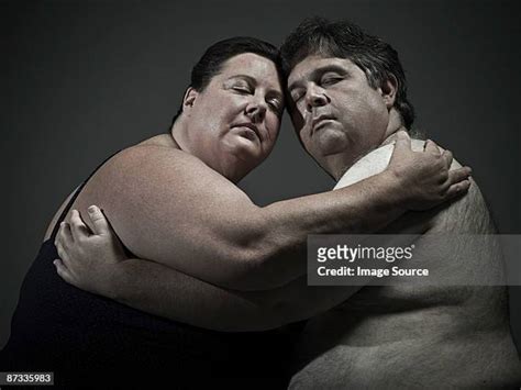 Fat Man Hug Photos And Premium High Res Pictures Getty Images