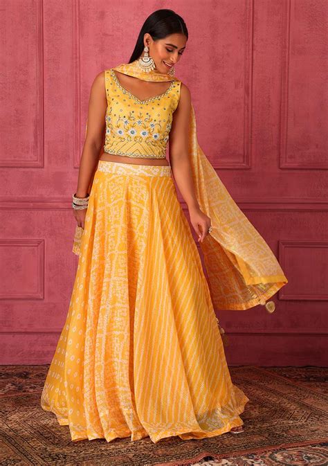 Buy Women Light Yellow Bandhani Print Lehenga Set With Embroidered