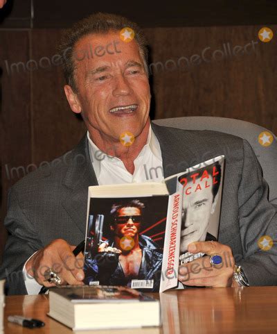 Photos and Pictures - October 5, 2012, Los Angeles, CA. Arnold Schwarzenegger signing copies of ...