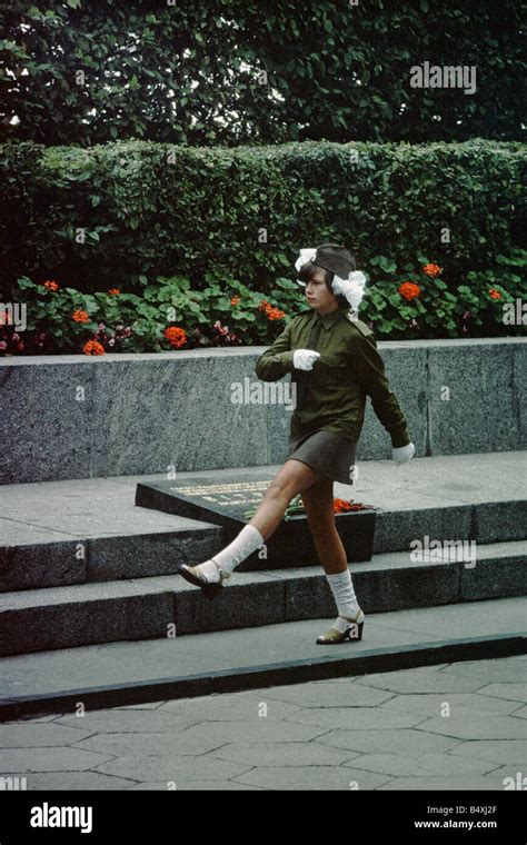 Girl guard goose-stepping at war memorial in Kiev, Ukraine Stock Photo - Alamy