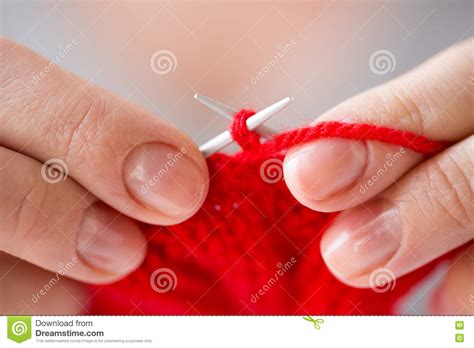 Close Up Of Hands Knitting With Needles And Yarn Stock Photo Image Of