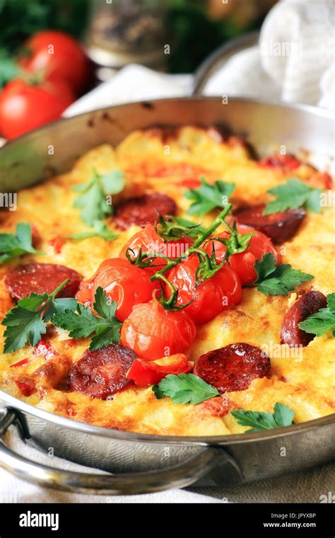 Spanish Omelette Tortilla De Patas With Chorizo And Cherry Tomatoes