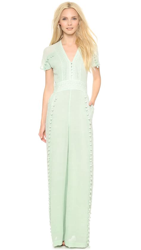 Marchesa Voyage Paneled Pom Pom Jumpsuit Mint In Green Lyst