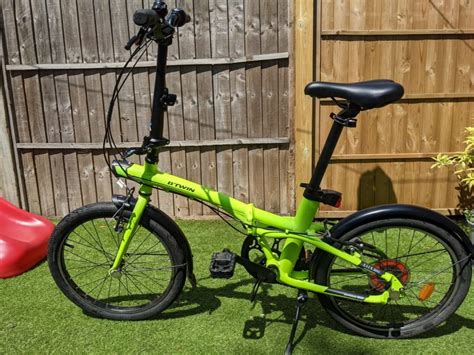 Btwin Tilt 500 Folding Bike Green Folding Bikes 4U Folding Bikes 4U