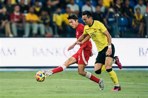 Football: Hong Kong beaten by Malaysia, lose a passport but may gain ...